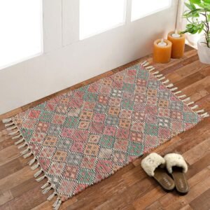 Handmade upcycled sustainable dhurrie rug with modern floral print for living room decor.