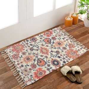 Handmade upcycled sustainable dhurrie rug with modern floral print for living room decor.