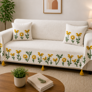 tessel and embrodiery and slug cotton add these word in the title   White Daisy Floral Embroidered Sofa Cover – Premium Slub Cotton Set with Decorative Tassels | TheLitLoom