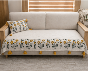 Beige Floral Sofa Cover with Mustard Embroidery and Tassels